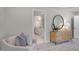 Main bedroom with dresser, seating, and bathroom view at 8805 Melvin St # 35, Willow Springs, NC 27592