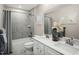 Modern bathroom with double vanity and bathtub at 8829 Tartan Clan Dr, Willow Springs, NC 27592