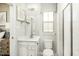 Clean bathroom with a vanity, toilet and shower at 8829 Tartan Clan Dr, Willow Springs, NC 27592