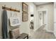 Inviting entryway with decorative wall art and a bench at 8829 Tartan Clan Dr, Willow Springs, NC 27592