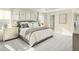 Large main bedroom with a comfortable bed and large dresser at 8829 Tartan Clan Dr, Willow Springs, NC 27592
