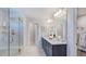 Bathroom with double vanity, shower, and tile flooring at 101 Cloud Berry Ln, Holly Springs, NC 27540