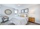 Well-lit bedroom with comfortable bed and nightstands at 101 Cloud Berry Ln, Holly Springs, NC 27540
