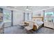 Spacious main bedroom with a large bed and seating area at 101 Cloud Berry Ln, Holly Springs, NC 27540