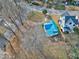 House with teal roof and large lot, next to other houses at 110 Summit Ave, Raleigh, NC 27603