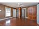 Hardwood floor bedroom with closet and built-in cabinet at 110 Summit Ave, Raleigh, NC 27603