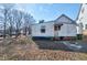 Rear view of a white house with teal roof at 110 Summit Ave, Raleigh, NC 27603