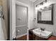 Bathroom with sink, mirror, and toilet at 1117 Beechwood Dr, Rocky Mount, NC 27803