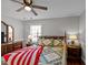 Bedroom with wooden bed frame and ceiling fan at 1117 Beechwood Dr, Rocky Mount, NC 27803
