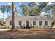 White ranch home with black windows and landscaping at 1117 Beechwood Dr, Rocky Mount, NC 27803