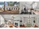White ranch home with black windows, steps, and landscaping at 1117 Beechwood Dr, Rocky Mount, NC 27803