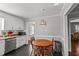Kitchen with table for two and hexagon tile floor at 1117 Beechwood Dr, Rocky Mount, NC 27803
