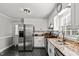 Modern kitchen with stainless steel appliances and granite countertops at 1117 Beechwood Dr, Rocky Mount, NC 27803