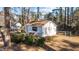 White shed with dark trim in backyard at 1117 Beechwood Dr, Rocky Mount, NC 27803