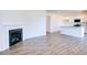 Living room with hardwood floors and a corner fireplace at 1132 Middlecrest Dr, Rocky Mount, NC 27804