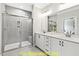 Double vanity bathroom with large walk-in shower at 116 Mohave Dr, Louisburg, NC 27549