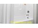 Simple bathroom with a bathtub and shower at 116 Mohave Dr, Louisburg, NC 27549