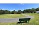 Peaceful walking path with green space and bench at 116 Mohave Dr, Louisburg, NC 27549