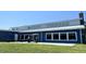 Modern clubhouse with large windows and patio at 116 Mohave Dr, Louisburg, NC 27549