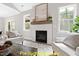 Modern fireplace with hexagon tile surround at 116 Mohave Dr, Louisburg, NC 27549