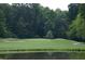 Picturesque golf course with water features at 116 Mohave Dr, Louisburg, NC 27549