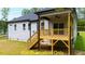 House exterior showcasing a deck and stairs at 116 Mohave Dr, Louisburg, NC 27549