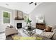Spacious living room with fireplace and large windows at 116 Mohave Dr, Louisburg, NC 27549