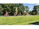 Community playground with slides and play structures at 116 Mohave Dr, Louisburg, NC 27549