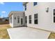 Spacious backyard with a concrete patio that's perfect for outdoor living at 1246 Jamestowne Dr, Elon, NC 27244