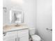 Clean half-bathroom with a pedestal sink and toilet at 1246 Jamestowne Dr, Elon, NC 27244