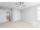 Bright bedroom featuring a ceiling fan, closet, neutral walls, and ample natural light at 1246 Jamestowne Dr, Elon, NC 27244