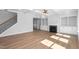 Open living room with coffered ceilings, fireplace, and built-in bookshelves at 1246 Jamestowne Dr, Elon, NC 27244
