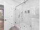 Bright bathroom featuring large tiled shower with glass enclosure, adding a touch of elegance at 1246 Jamestowne Dr, Elon, NC 27244