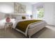 Bedroom with king-size bed, neutral decor, and natural light at 1264 Hardin Hill Ln, Knightdale, NC 27545