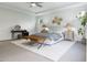 Spacious primary bedroom with ample natural light and stylish furnishings at 1264 Hardin Hill Ln, Knightdale, NC 27545