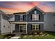 Charming two-story home featuring a covered front porch at 1264 Hardin Hill Ln, Knightdale, NC 27545