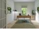Bright home office with wood desk, window, and neutral decor at 1264 Hardin Hill Ln, Knightdale, NC 27545