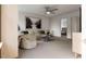 Bright and airy living room featuring a comfortable sofa and large artwork at 1264 Hardin Hill Ln, Knightdale, NC 27545