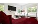 Elegant living room with a large TV and comfortable seating at 1264 Hardin Hill Ln, Knightdale, NC 27545