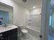 Bathroom with a bath tub and single sink vanity at 136 Parker Ln, Mebane, NC 27302
