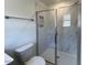 Modern bathroom features a glass-enclosed shower with tiled walls at 136 Parker Ln, Mebane, NC 27302