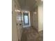 Second floor hallway with closet and carpeted flooring at 136 Parker Ln, Mebane, NC 27302