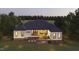New construction home featuring a large deck and private backyard at 139 Quail Pt, Pittsboro, NC 27312
