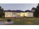 Home features a backyard deck and beautifully landscaped yard at 139 Quail Pt, Pittsboro, NC 27312
