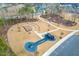 Aerial view of community park with playground, amphitheater, and walking paths at 1701 Mallard Trace Dr, Wendell, NC 27591