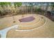 Stone amphitheater with wooden stage at 1701 Mallard Trace Dr, Wendell, NC 27591