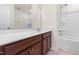 Bathroom with vanity, tub, and mirror at 1701 Mallard Trace Dr, Wendell, NC 27591