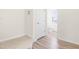 Simple bathroom with toilet and hardwood floor at 1701 Mallard Trace Dr, Wendell, NC 27591