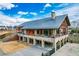 Modern clubhouse with stone and metal exterior at 1701 Mallard Trace Dr, Wendell, NC 27591