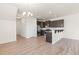 Kitchen features dark cabinetry, granite countertops and stainless steel appliances at 1701 Mallard Trace Dr, Wendell, NC 27591